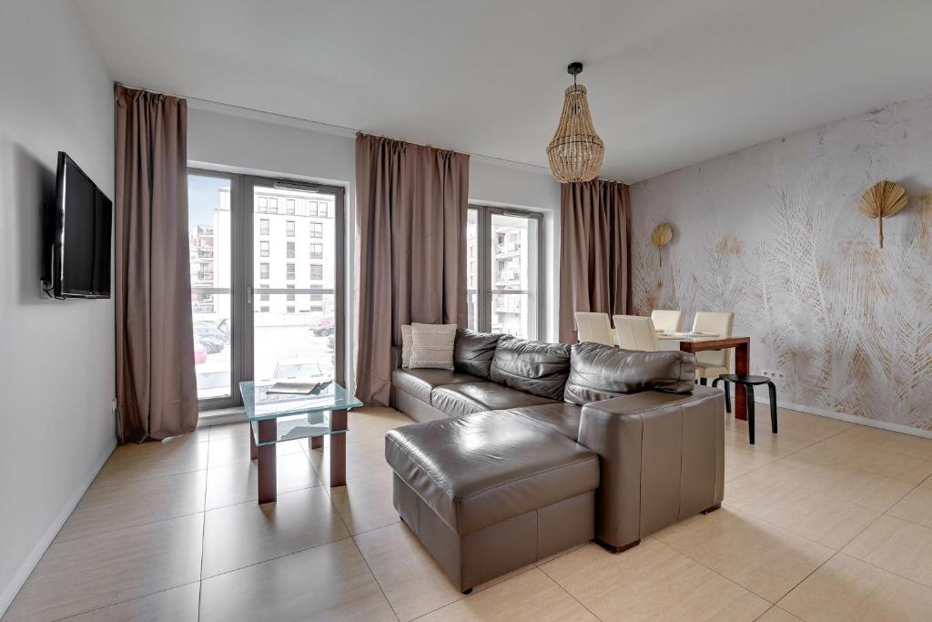 TV&#47;Unterhaltungsangebot in der Unterkunft Waterlane Riverside - SPA, Pool, Gym &amp; Parking by Downtown Apartments