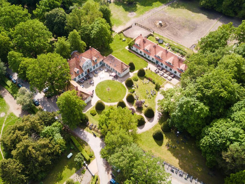 an overhead view of a large mansion with trees at Jagdschloss Friedrichsmoor in Neustadt-Glewe