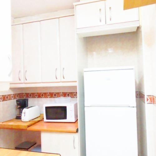 Kuchyň nebo kuchyňský kout v ubytování Apartamento En Alcalá De Henares