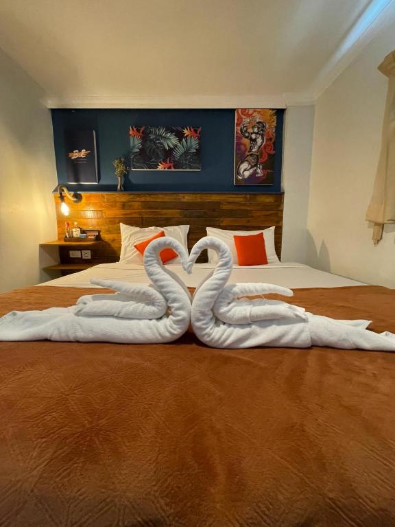Postel nebo postele na pokoji v ubytování BH Baan Paradise Hotel Patong