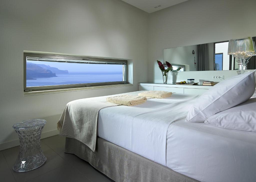 Ένα ή περισσότερα κρεβάτια σε δωμάτιο στο Youphoria Villas