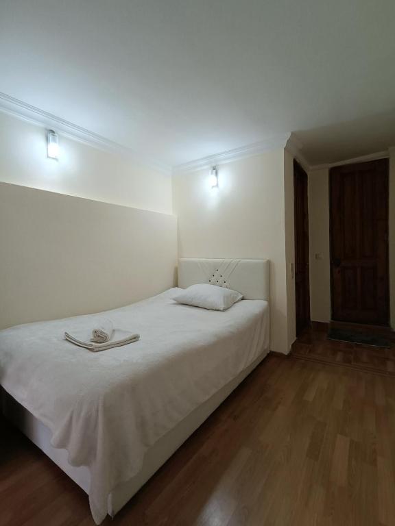 Postel nebo postele na pokoji v ubytování Guest House Lili