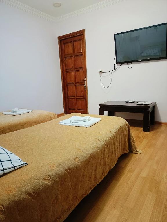 Postel nebo postele na pokoji v ubytování Guest House Lili