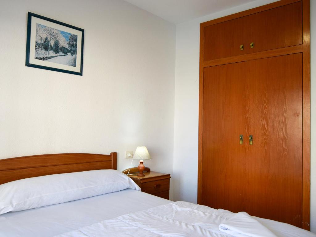 Postel nebo postele na pokoji v ubytování Apartamentos Azahar 3000