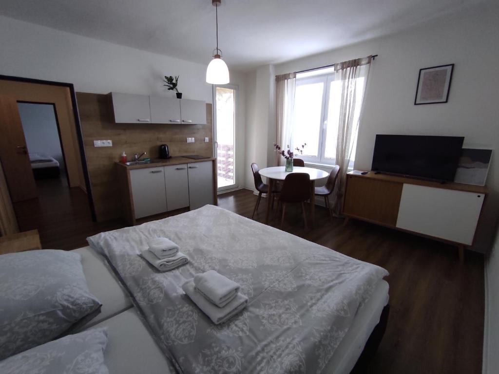 Postel nebo postele na pokoji v ubytování Symple apartments