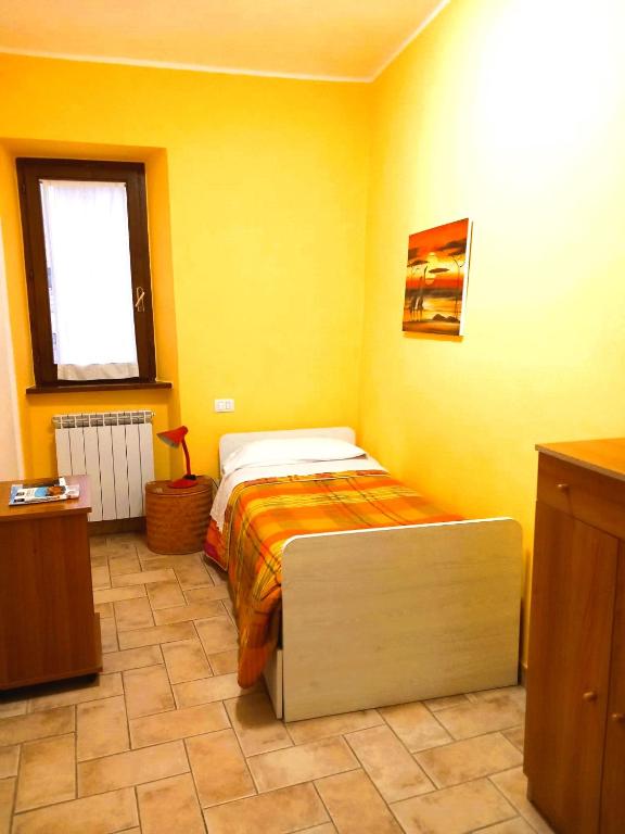 Postel nebo postele na pokoji v ubytování Borgo San Savino