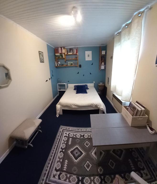 Postel nebo postele na pokoji v ubytování Malpas125 chambres