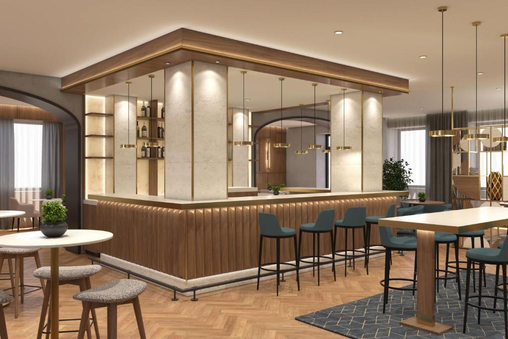 a rendering of a restaurant with tables and chairs at AC Hotel by Marriott Clodio Roma in Rome
