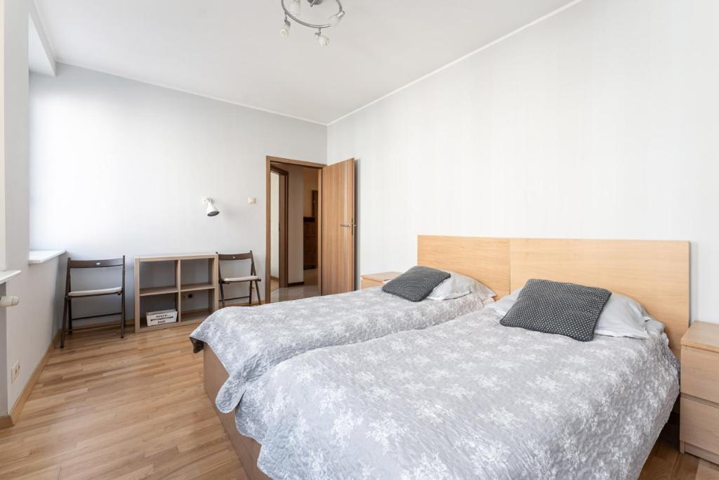 Posteľ alebo postele v izbe v ubytovaní Apartament Świętego Ducha 3234
