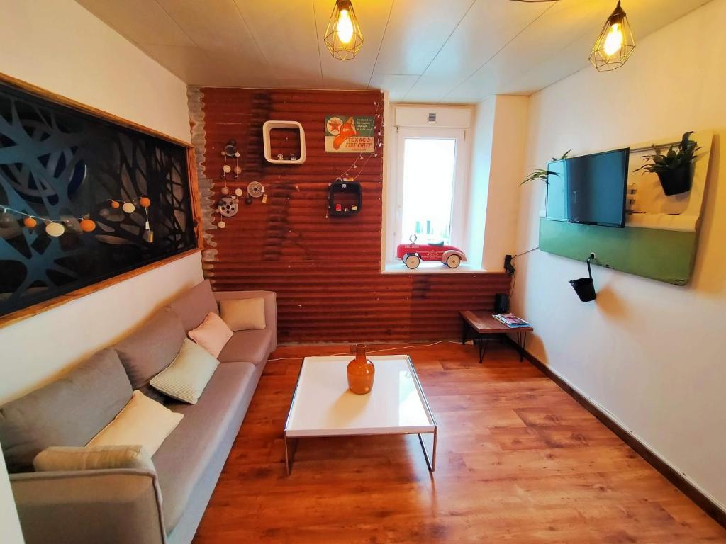 TV a/nebo společenská místnost v ubytování ConcarnOLoc