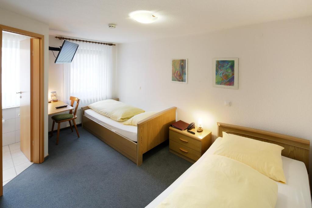 Postel nebo postele na pokoji v ubytování Landgasthof Kaiser