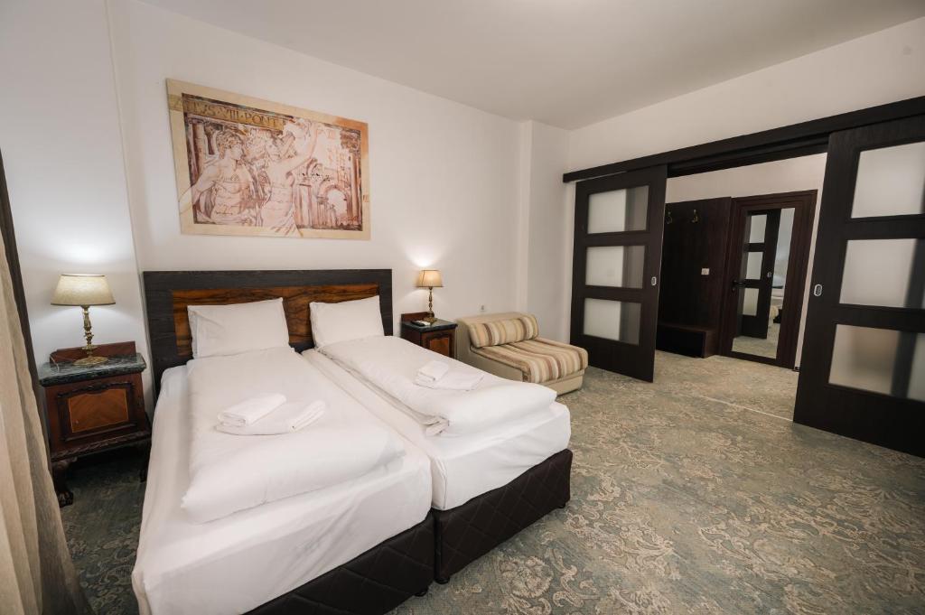 Postel nebo postele na pokoji v ubytování Лондонъ - къща за гости / London - guest house