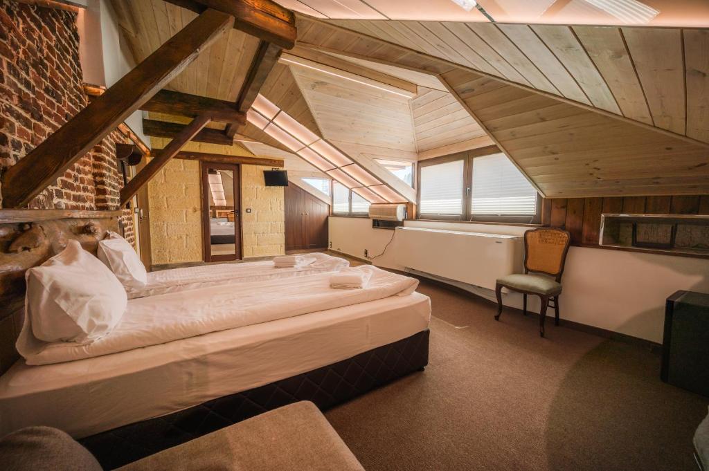 Postel nebo postele na pokoji v ubytování Лондонъ - къща за гости / London - guest house