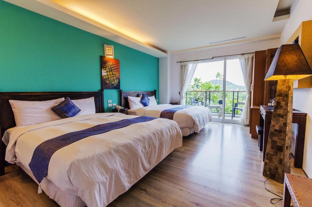 Letto o letti in una camera di Seasons Bali Fashion Inn