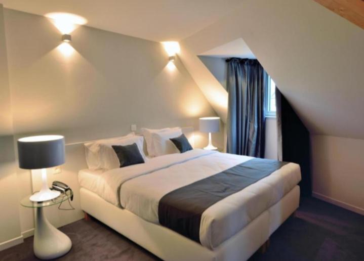 a bedroom with a large bed in a room at Sky apartments FREE PARKING in Wrocław