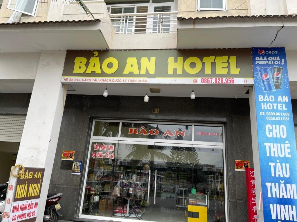 a bao an hotel sign in front of a store at Bảo An Hotel- Tuần Châu Hạ Long in Ha Long
