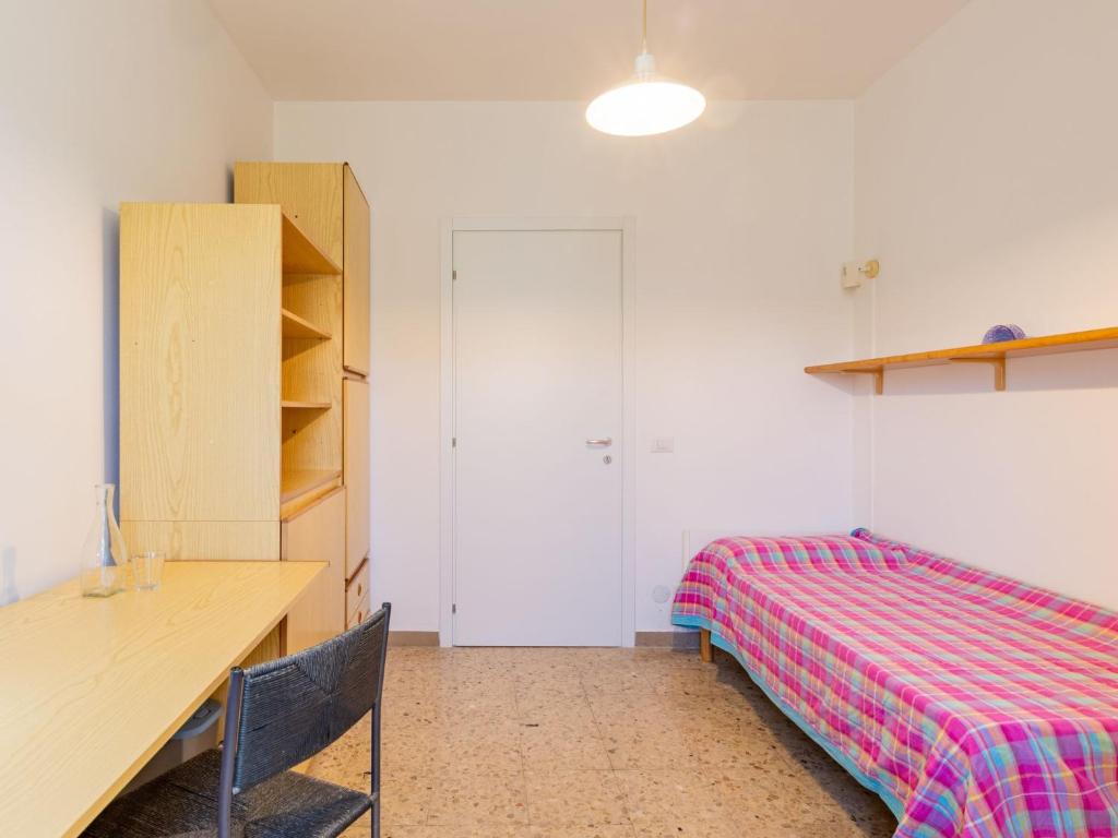 Postel nebo postele na pokoji v ubytování Apartment Giulia by Interhome