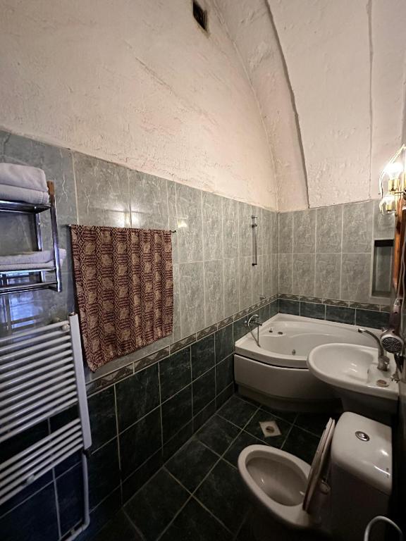 Koupelna v ubytování Tokmak Konukevi