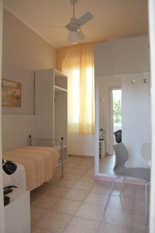 Postel nebo postele na pokoji v ubytování Hotel Gardenia