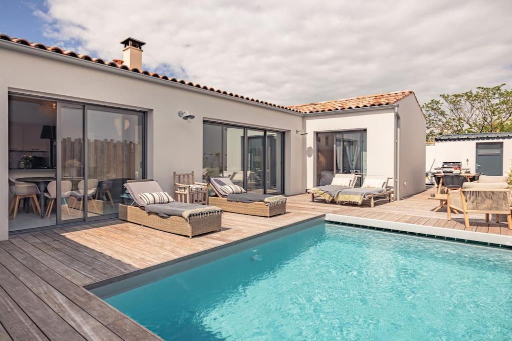 Photo de la galerie de l'établissement La Villa Rose - Somptueuse maison familiale, à Marsilly