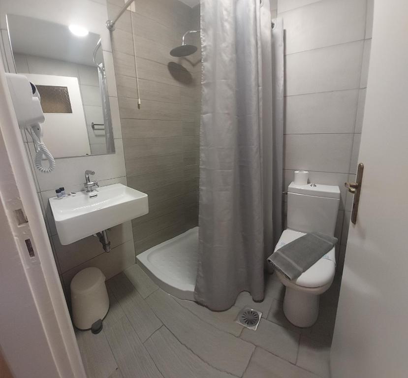 Koupelna v ubytování Hotel Avra