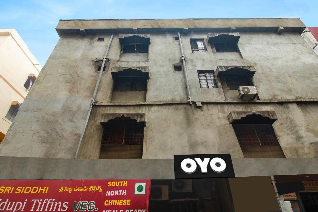 an old building with windows and an oro sign on it at Grand Aarvi inn in Hyderabad