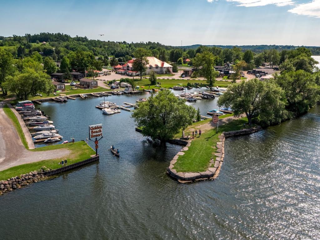 an aerial view of a marina with boats in the water at 2 Bedroom Harbor Front Cottage 2 in Roseneath