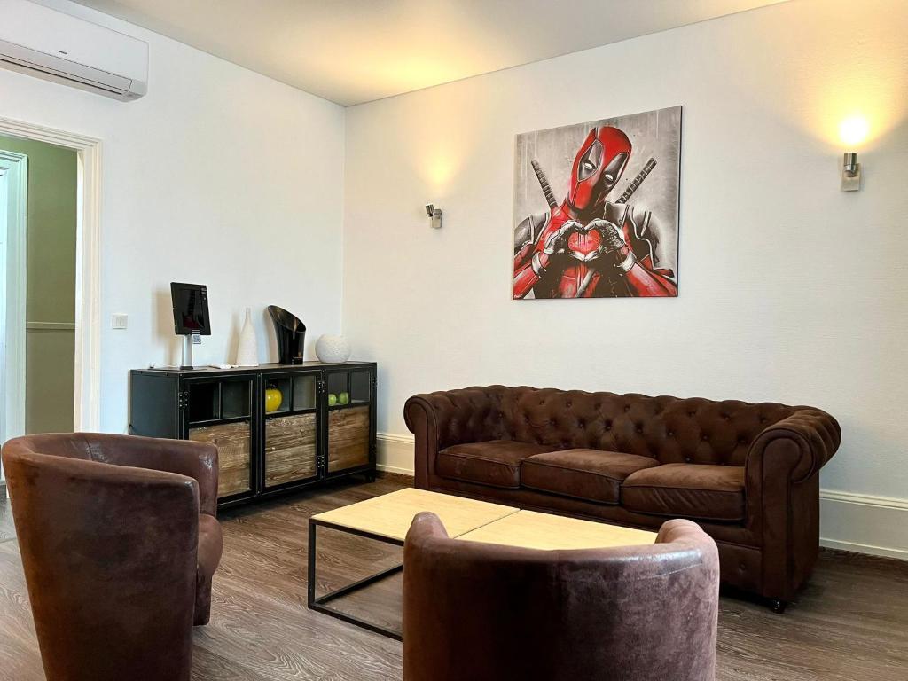 Posezení v ubytování HOTEL & SPA Le Renard Centre