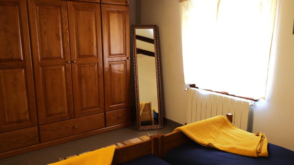 Posteľ alebo postele v izbe v ubytovaní Casa Cocola