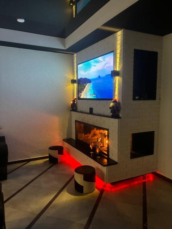 TV a/nebo společenská místnost v ubytování Villa Victoria in Bakuriani