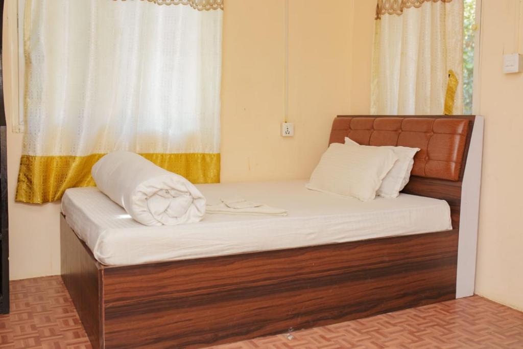 A bed or beds in a room at Gypsy Hostel & Backpackers