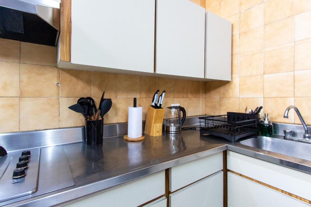 Kuchyň nebo kuchyňský kout v ubytování CoNomad House - Coliving & Coworking