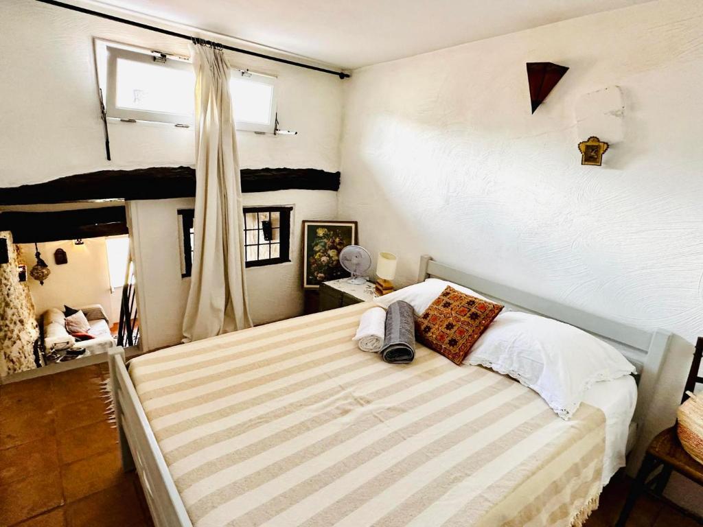 Кровать или кровати в номере Maison Historique rue Vermeille Argeles sur mer