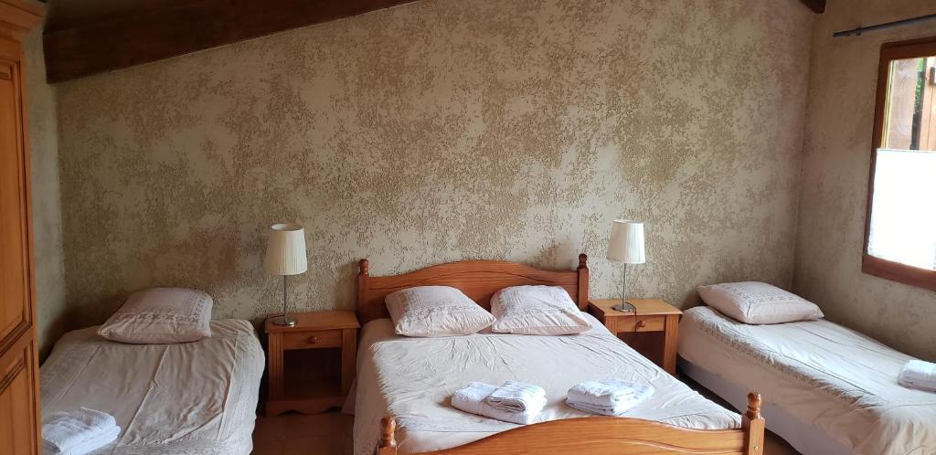 Postel nebo postele na pokoji v ubytování Auberge Les Myrtilles