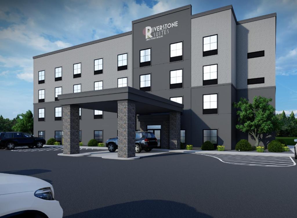 a rendering of a rendering of a new office building at Riverstone Suites by Cobblestone Hotels - Chippewa Falls in Chippewa Falls