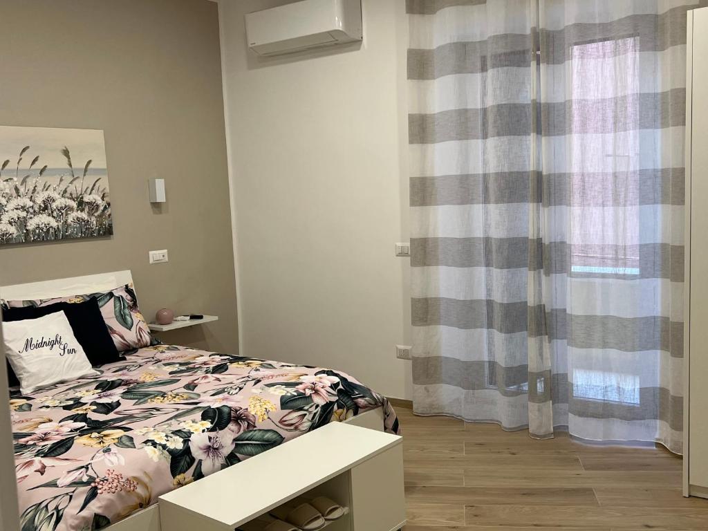 Postel nebo postele na pokoji v ubytování Midnight Sun