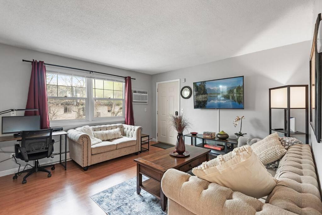 a living room with a couch and a table at Tranquil 2BR Apt Mpls - 8075 Apt 3 in Minneapolis