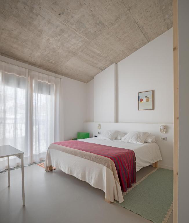 Postel nebo postele na pokoji v ubytování Ses Sucreres Small & Slow Hotel