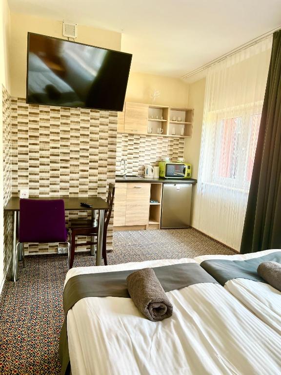 LAS SŁUPSKI APARTAMENTY PREMIUM Wifi Netflix Smart TV50 Cisza Spokój Wysoka jakość za niską cenę Zapraszamy - Deluxe Room No. 19 Con Cocina Y Una Vista Del Bosque