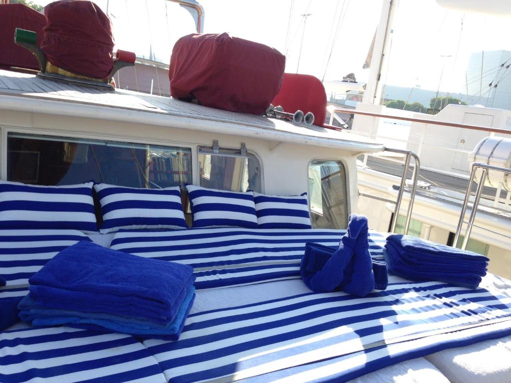a group of blue pillows sitting on a boat at Southern Cross in Barcelona