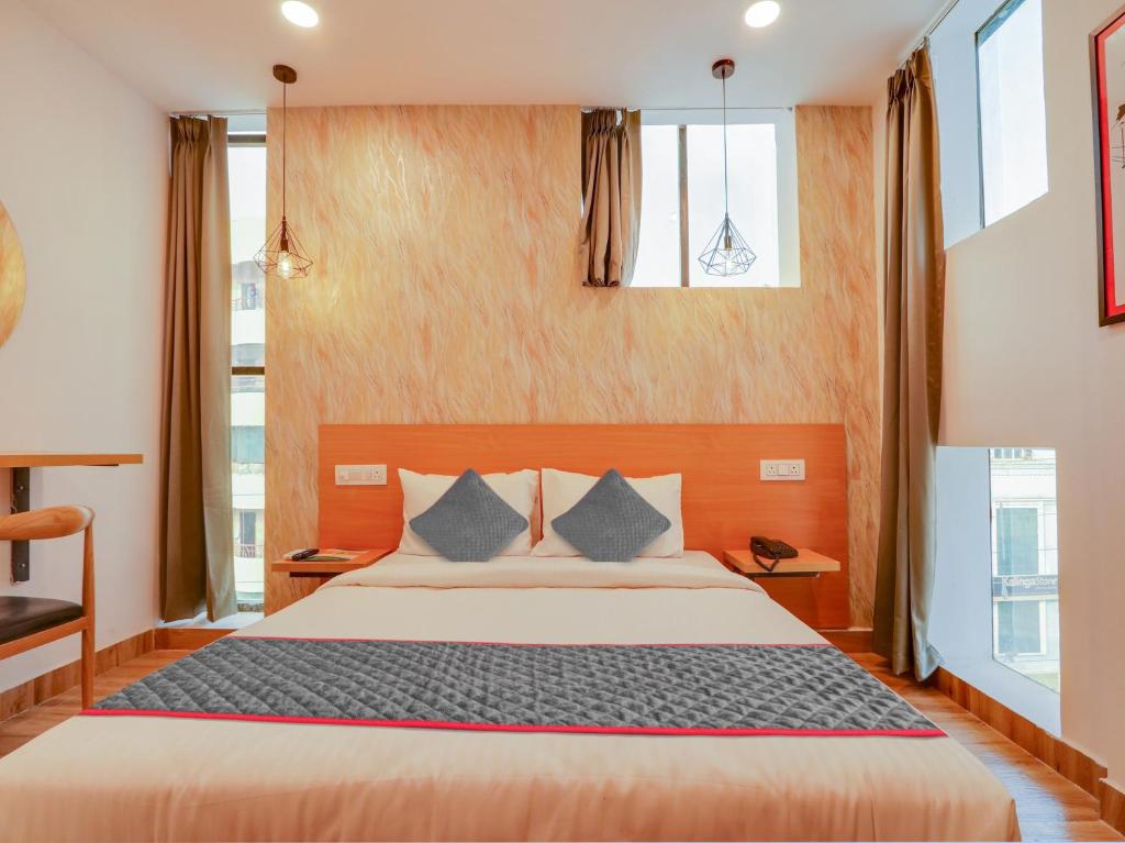 Ένα ή περισσότερα κρεβάτια σε δωμάτιο στο Super Townhouse 1305 CASA GRAND