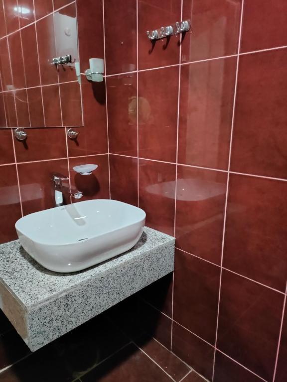 Koupelna v ubytování Tornado Hotel