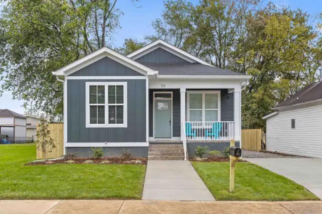 a home with a gray house at Downtown Chattanooga that Sleeps 8 with a Pool Table in Chattanooga