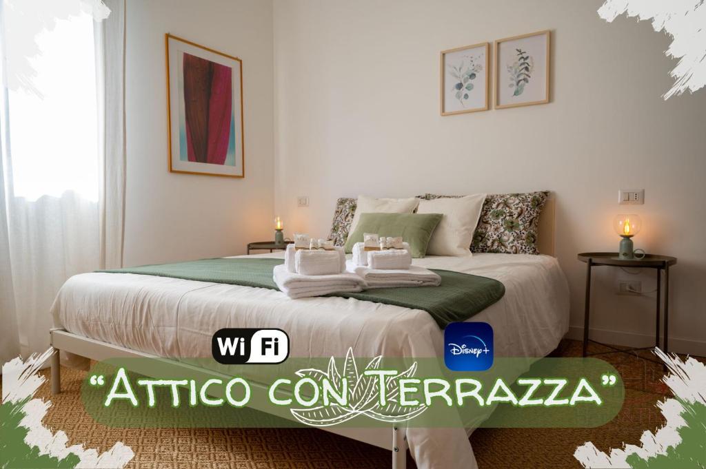 a bedroom with a bed in a room at [Penthouse with Terrace] • Sea 5Min • Trains 4Min in Varazze