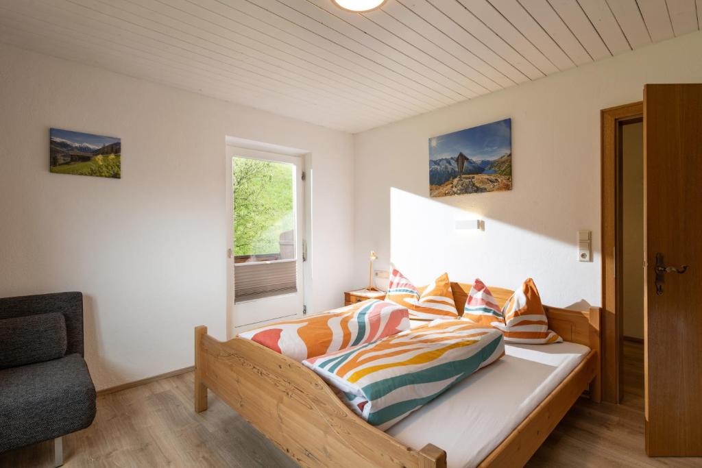 Postel nebo postele na pokoji v ubytování Ferienhaus Am Steindl "Steindlhof"