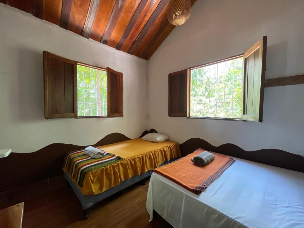 Postel nebo postele na pokoji v ubytování Hotel Mon Ami