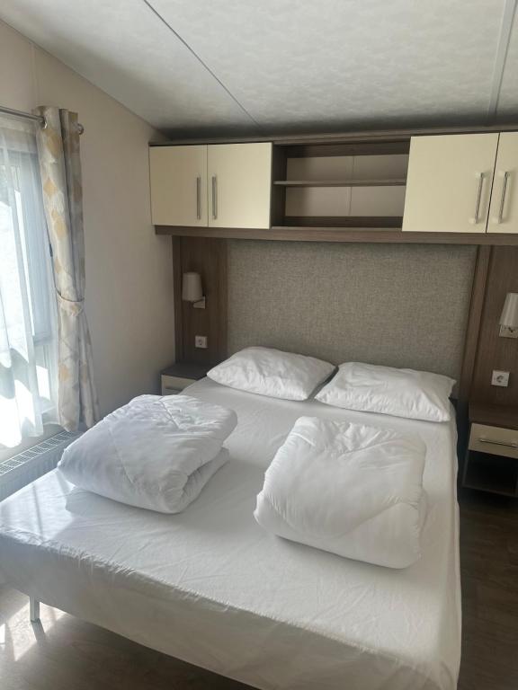 Ένα ή περισσότερα κρεβάτια σε δωμάτιο στο Chalet Sea Breeze