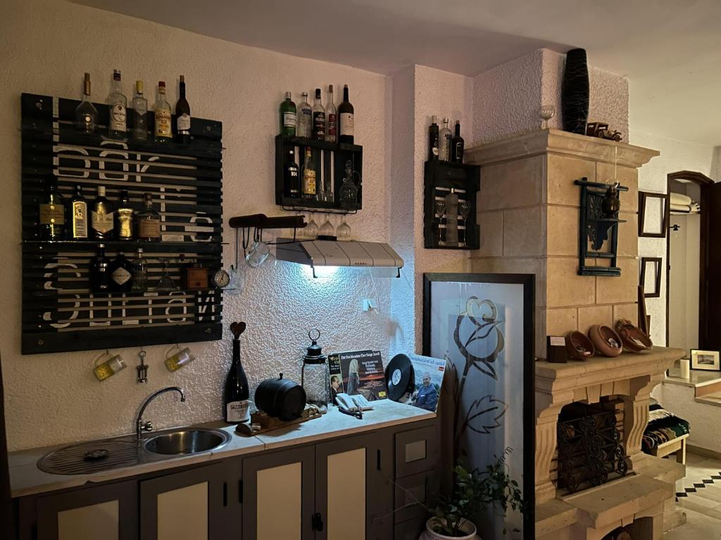 Kuchyň nebo kuchyňský kout v ubytování L'artisan