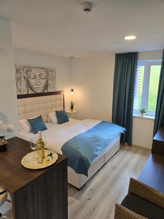 Postel nebo postele na pokoji v ubytování Apartmány Pulse
