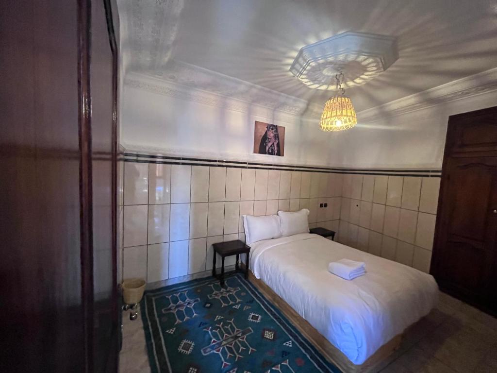 Postel nebo postele na pokoji v ubytování Riad Dar Zarbia